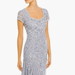 Adrianna Papell women’s long silver formal. Beading and tulle insets. Size 16